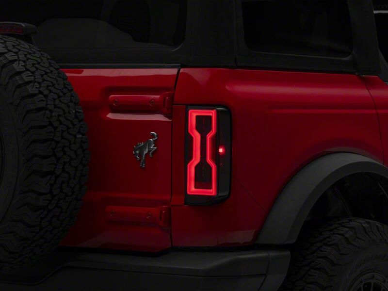 Raxiom 21-26 Ford Bronco Axial Series LED Tail Lights- Black Housing- Smoked Lens - FB37114 - front view