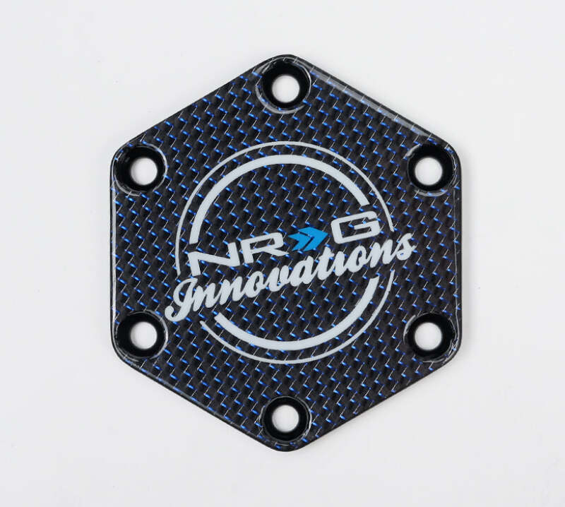 NRG Carbon Fiber w/ Blue Texalium Fabrics Horn Delete Button Circular Logo Front/ Back - STR-640CF/BL - close-up view