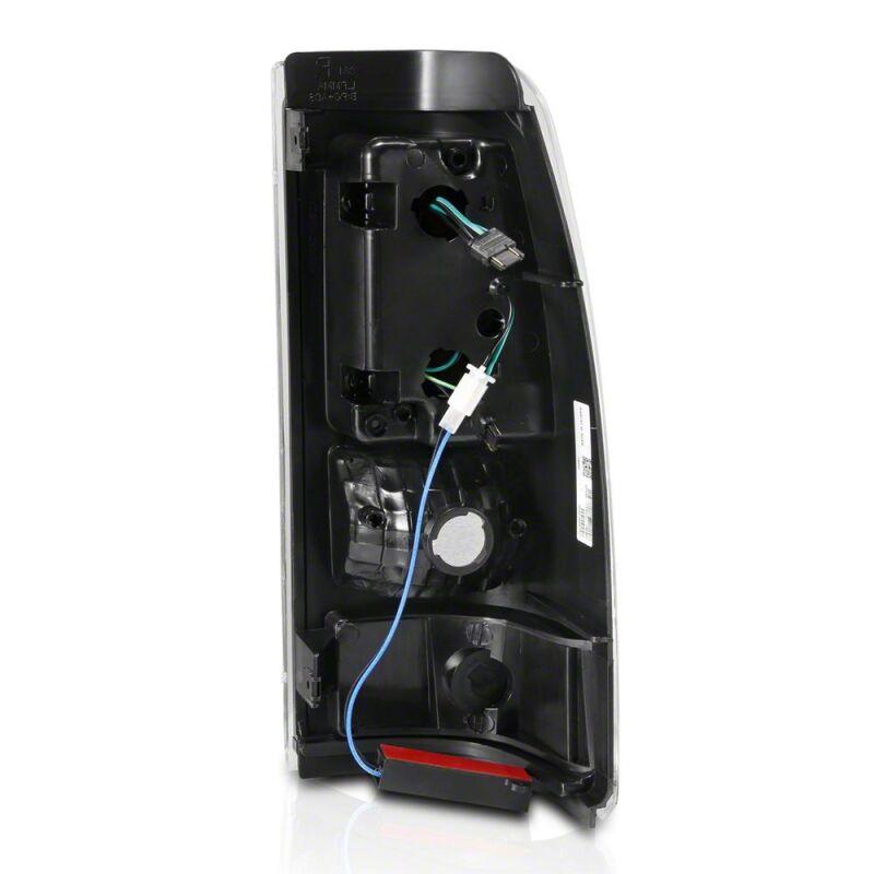 Raxiom 03-06 Chevrolet Silverado 1500 Fleetside Axial Series LED Tail Lights- Black - Clear Lens - S116734 - close-up view 2