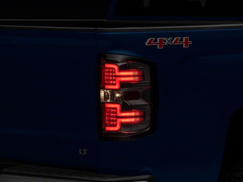 Raxiom 14-18 Chevrolet Silverado 1500 LED Tail Lights/SeqTurn Signals- Chrome- Smoked Lens - S114458 - close-up view 6