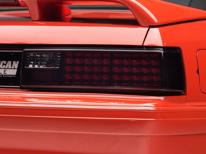 Raxiom 87-93 Ford Mustang Axial Series Smoked LED Tail Lights - 49056 - close-up view 3