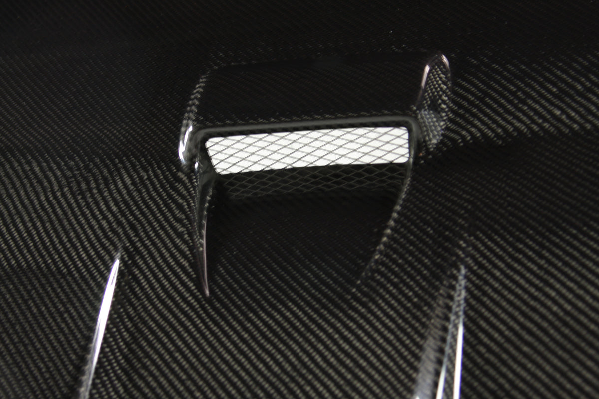 Seibon 08-09 Mitsubishi Lancer (CYA4/5A) DV Style Carbon Fiber Hood - HD0809MITLAN-DV