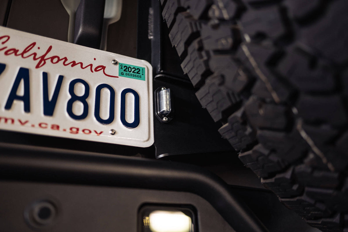 DV8 Offroad - Relocation Bracket - LPBR-03