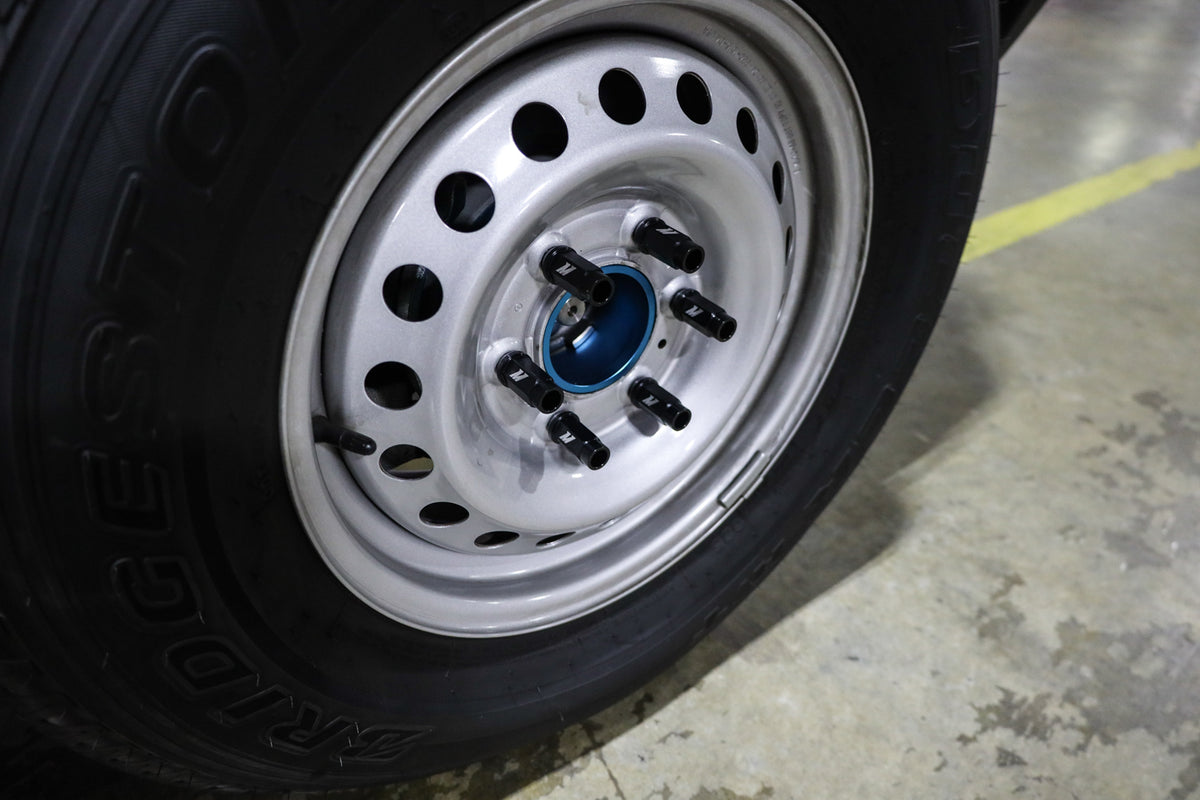 Mishimoto Aluminum Locking Lug Nuts M12x1.5 27pc Set Black - MMLG-15-27LBK for 2021-2026 Ford Bronco - installed view