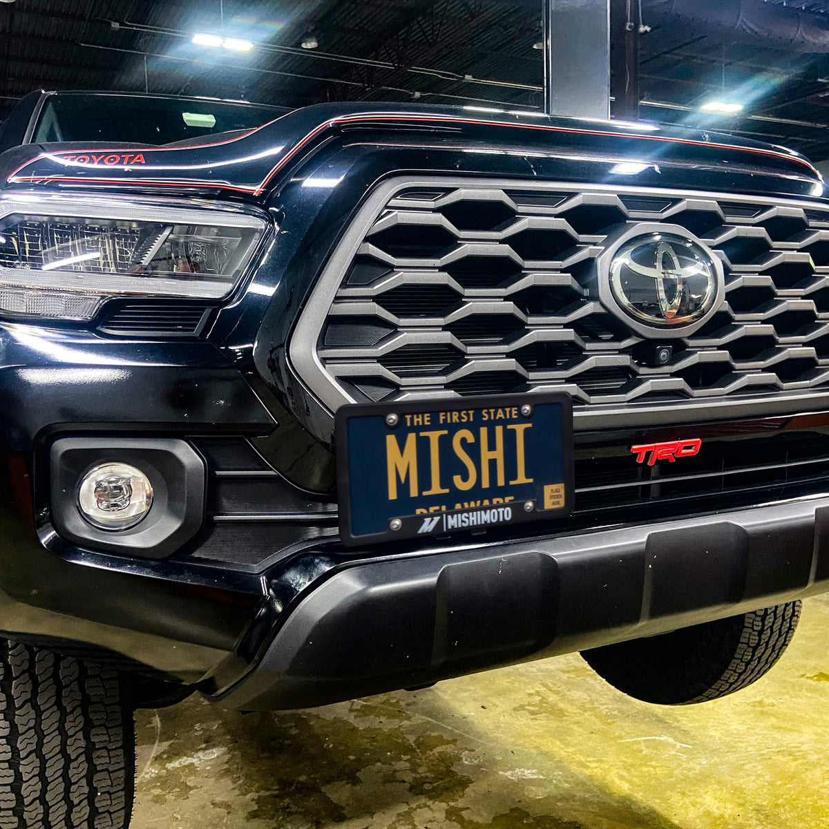 Mishimoto 16-23 Toyota Tacoma License Plate Relocation Kit - MMLP-TAC-16 for 2016-2023 Toyota Tacoma - close-up