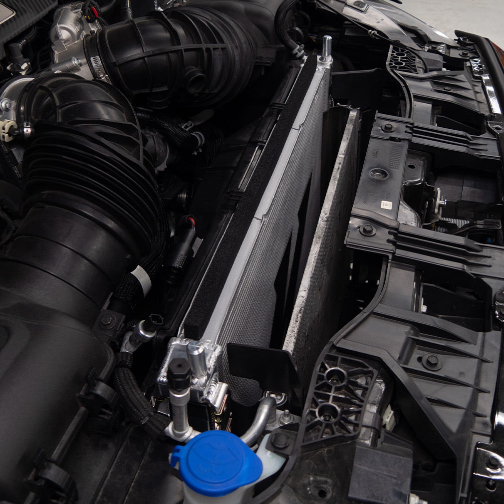 Mishimoto 2024+ Ford Mustang V8/2.3L Performance Aluminum Radiator - MMRAD-MUS-24 for 2024-2026 Ford Mustang - angle view