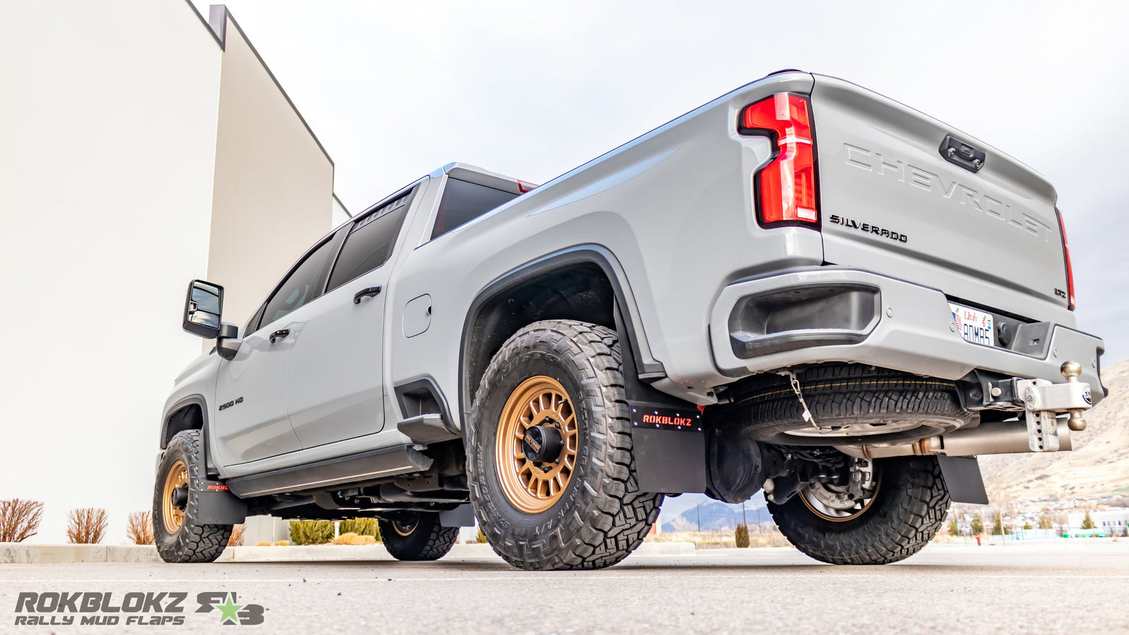 Rokblokz Step-Back Mud Flaps installed on 2020+ Chevy Silverado 2500HD for extra tire clearance and paint protection