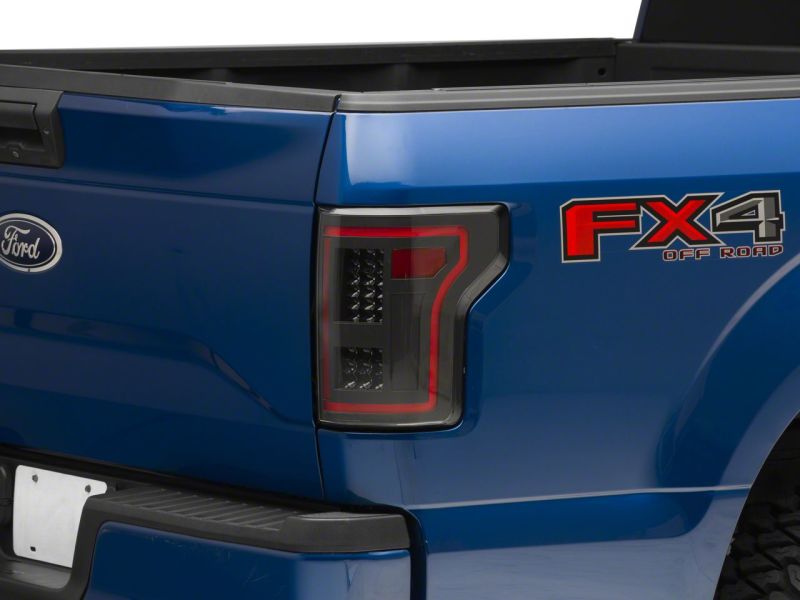 Raxiom 15-17 Ford F-150 LED Tail Lights w/ SEQL Turn Signals- Blk Housing (Clear Lens) - T544625