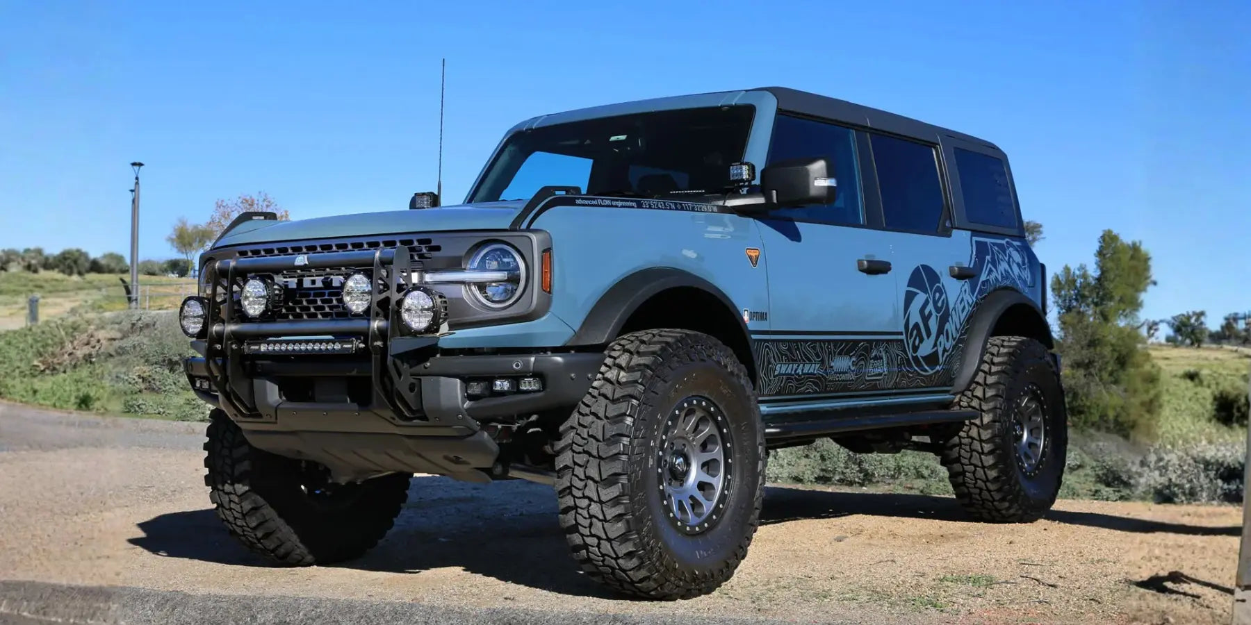 Ford Bronco with aFe Power upgrades, a bull bar, LED lights and off-road tires