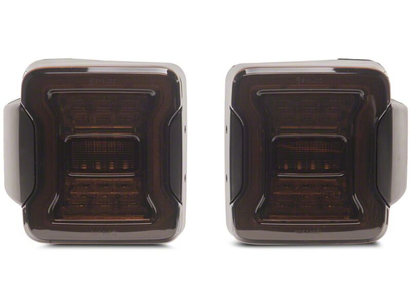 Raxiom 07-18 Jeep Wrangler JK Axial Series JL Style LED Tail Lights- Black Housing- Smoked Lens - J183257 - close-up view 8