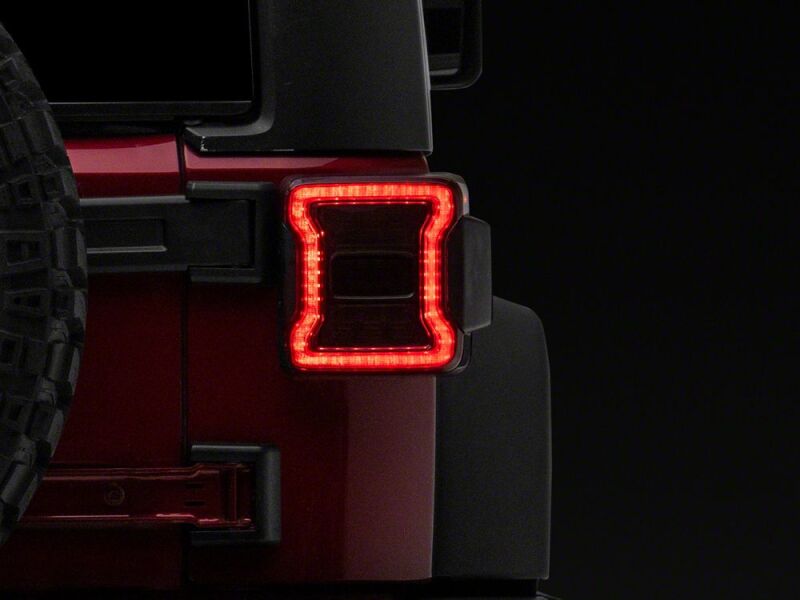 Raxiom 07-18 Jeep Wrangler JK LED Tail Lights- Red Housing- Smoked Lens - J181427 - close-up view 10