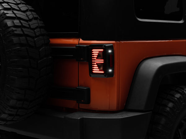 Raxiom 07-18 Jeep Wrangler JK Axial Series Vision LED Tail Lights- Black Housing (Smoked Lens) - J130808 for 2007-2018 Jeep W