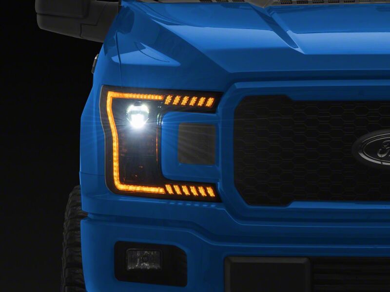 Raxiom 18-20 Ford F-150 LED Halo Surround Headlights with Amber DRL- Black Housing- Clear Lens - T583568 - front view