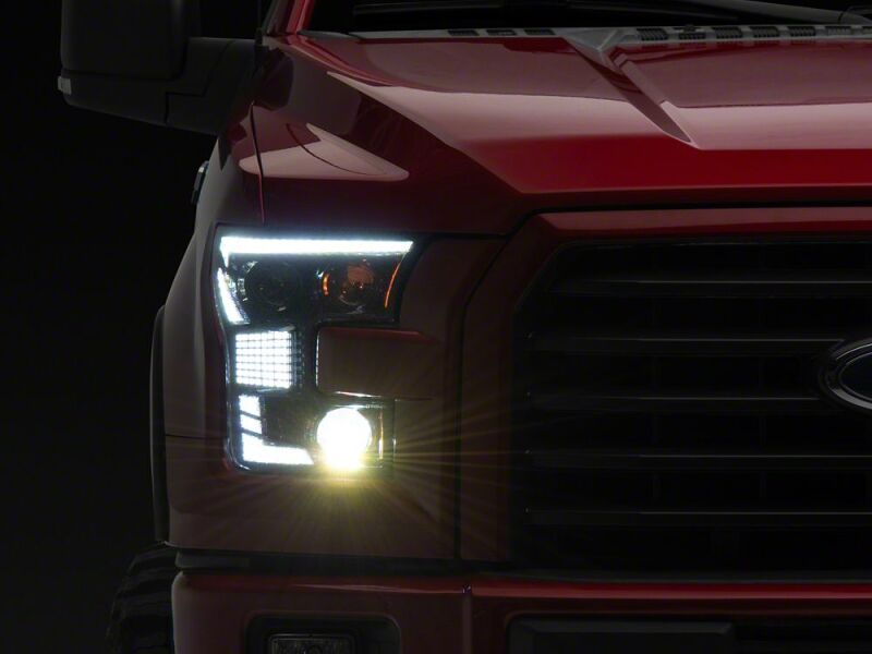 Raxiom 15-17 Ford F-150 XR Series LED Projector Headlights with DRL- Black Housing- Clear Lens - T577236 - front view