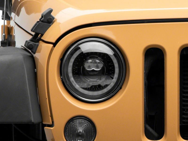 Raxiom 07-18 Jeep Wrangler JK Axial Series 7-In Dragon Eye LED Headlights- Blk Housing (Clear Lens) - J167194