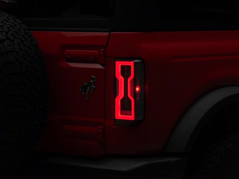 Raxiom 21-26 Ford Bronco Axial Series LED Tail Lights- Black Housing- Clear Lens - FB37113 - front view