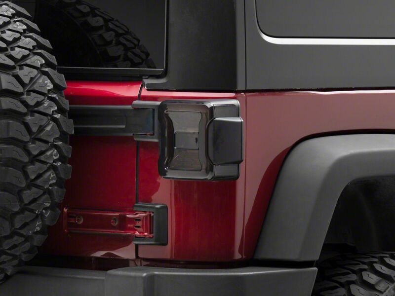 Raxiom 07-18 Jeep Wrangler JK LED Tail Lights- Red Housing- Smoked Lens - J181427 - close-up view 11