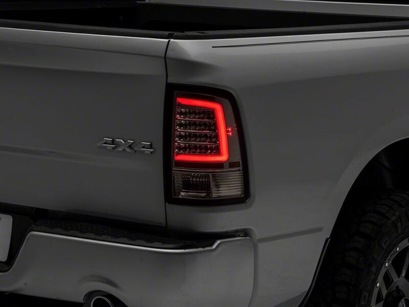 Raxiom 09-18 Dodge RAM 1500 Axial Series LED Tail Lights- Chrome Housing- Clear Lens - R113542 - front view