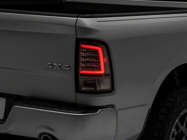 Raxiom 09-18 Dodge RAM 1500 Axial Series LED Tail Lights- Chrome Housing- Clear Lens - R113542 - front view