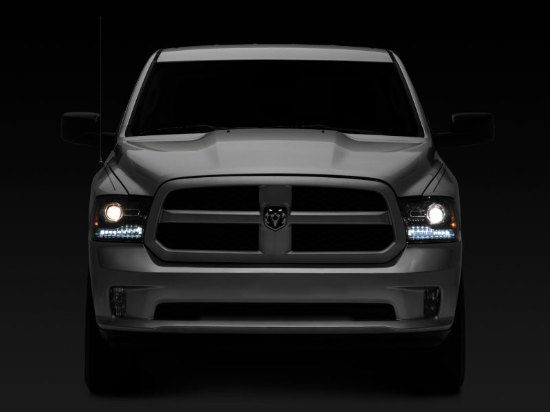 Raxiom 09-18 Dodge RAM 1500 LED Halo Headlights w/Switchback Turn Signals- Blk Housing (Clear Lens) - R111518