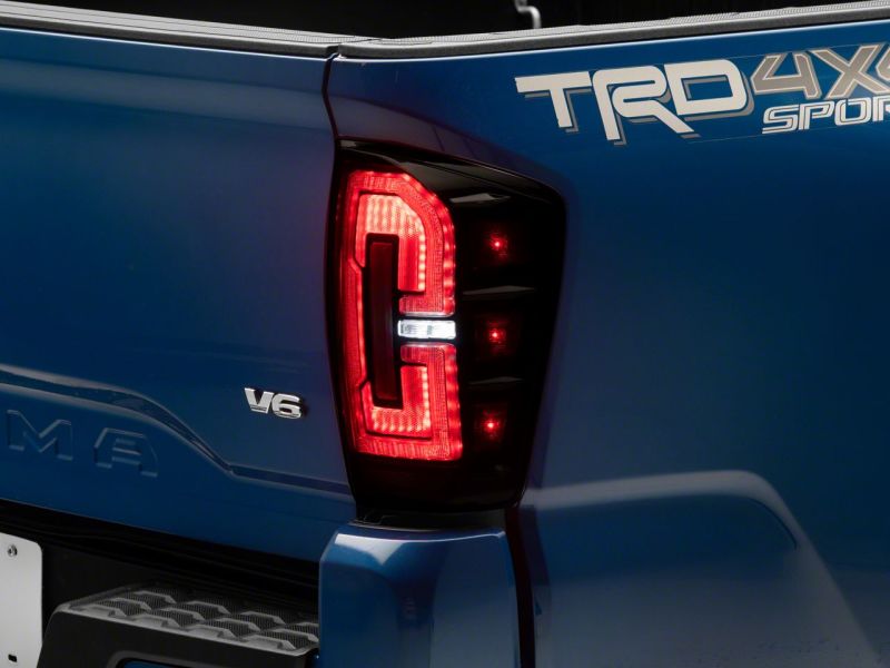 Raxiom 16-23 Toyota Tacoma LED Tail Lights- Blk Housing (Smoked Lens) - TT32385
