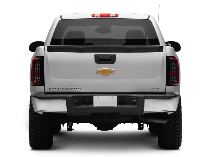 Raxiom 07-13 Chevrolet Silverado 1500 G2 LED Tail Lights- Black Housing- Smoked Lens - S112739 - close-up view 7