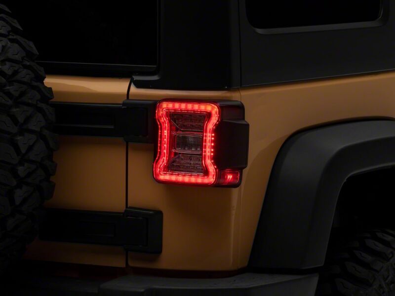 Raxiom 07-18 Jeep Wrangler JK LED Tail Lights- Clear Housing- Clear Lens - J178643 - front view