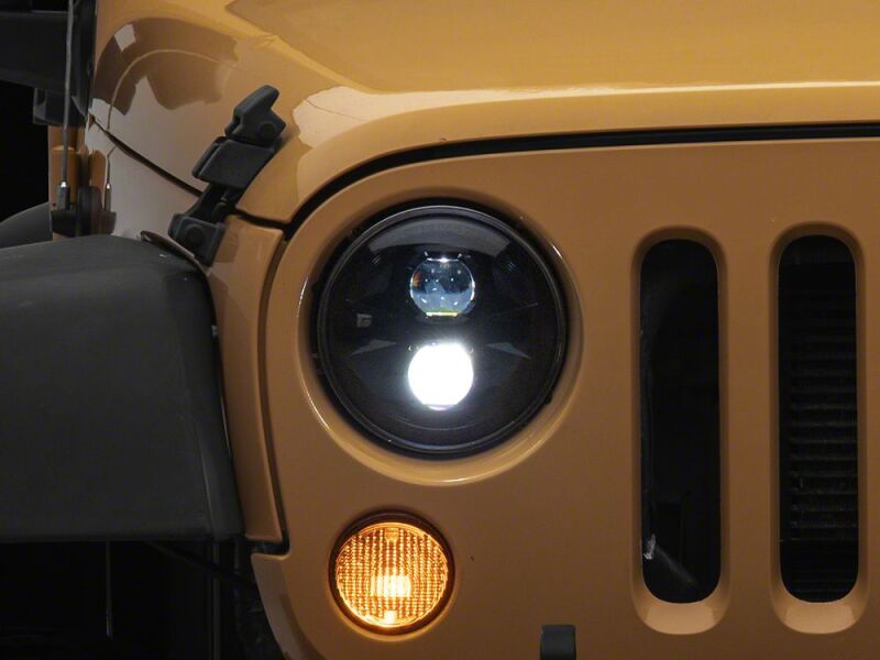 Raxiom 07-18 Jeep Wrangler JK Axial Series DB1 LED Headlights- Black Housing- Clear Lens - J181074 - front view