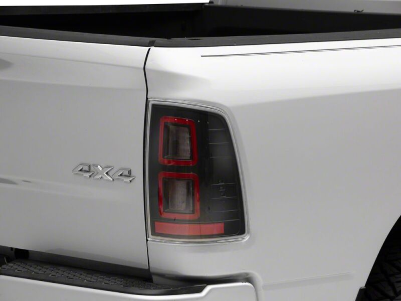 Raxiom 09-18 Dodge RAM 1500 LED Tail Lights- Black Housing- Clear Lens - R110153 - front view