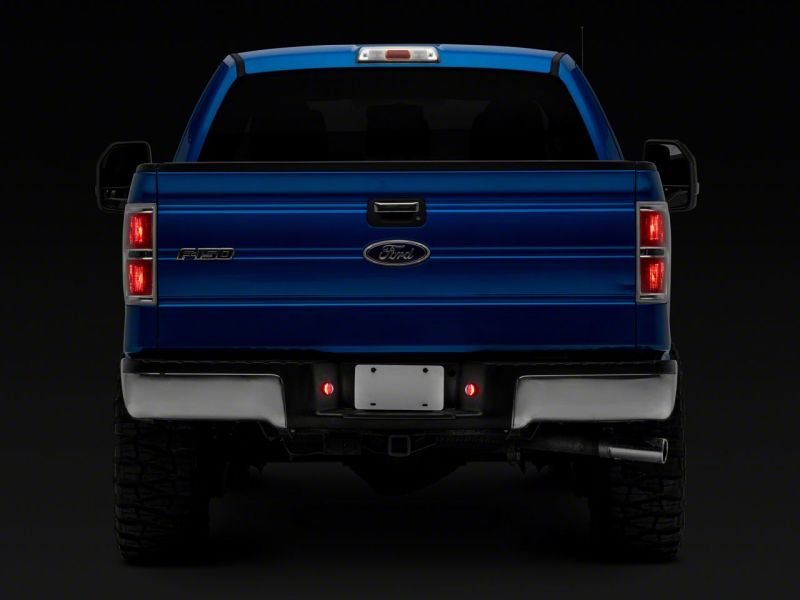 Raxiom 10-14 Ford F-150 Axial Series LED License Plate Lamps- Red and White - T557361