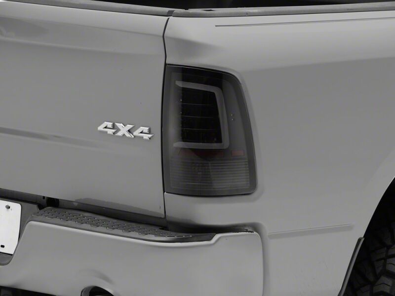 Raxiom 09-18 Dodge RAM 1500 Axial Series LED Tail Lights- Black Housing- Smoked Lens - R113540 - close-up view 6