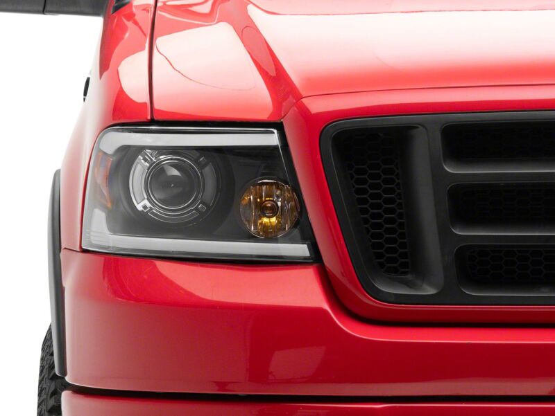 Raxiom 04-08 Ford F-150 Axial Series Projector Headlights with LED Bar- Black Housing- Clear Lens - T566363 for 2004-2008 Ford F 150 - close-up view 11