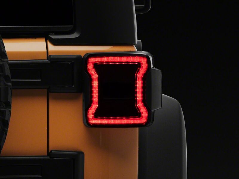 Raxiom 07-18 Jeep Wrangler JK Axial Series JL Style LED Tail Lights- Black Housing- Smoked Lens - J183257 - close-up view 12