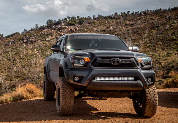 Cali Raised 05-15 Toyota Tacoma 32In Lower Bumper Hidden Led Bar Brackets Kit-Amber Backlight - Tall - CR2470 - front view