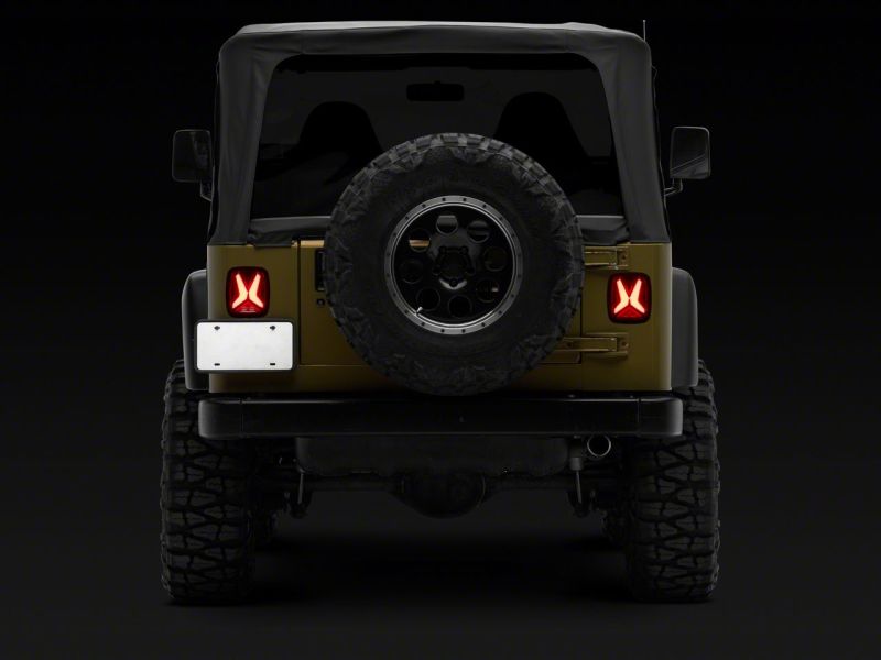 Raxiom 76-06 Jeep CJ7 Wrangler YJ &amp; TJ Gladiator LED Tail Lights- Blk Housing (Smoked Lens) - J177410