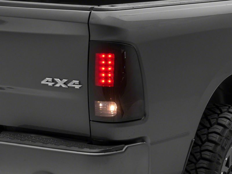 Raxiom 09-18 Dodge RAM 1500/2500/3500 Axial Series LED Tail Lights- BlkHousing- SmokedLens - R131283