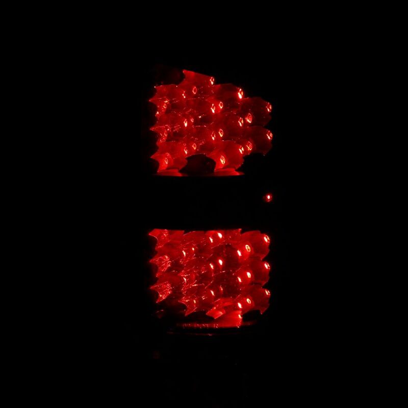 Raxiom 02-05 Dodge RAM 1500 LED Tail Lights- Black Housing- Clear Lens - R110151 - close-up view 2