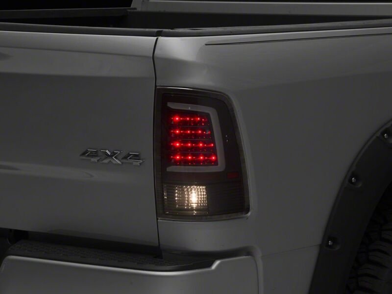 Raxiom 09-18 Dodge RAM 1500 Axial Series LED Tail Lights- Black Housing- Clear Lens - R113541 - close-up view 7