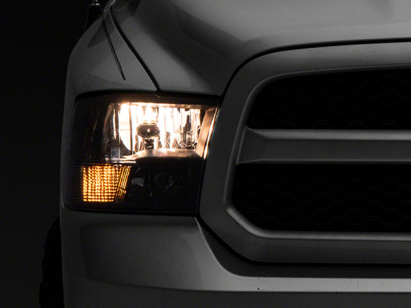 Raxiom 09-18 Dodge RAM 1500 Axial Series Euro Style Headlights w/ Dual Bulb Blk Housing (Clear Lens) - R118016 for 2009-2010 