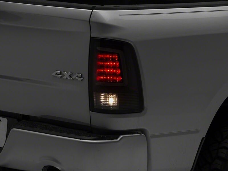 Raxiom 09-18 Dodge RAM 1500 Axial Series LED Tail Lights- Black Housing- Smoked Lens - R113540 - close-up view 8