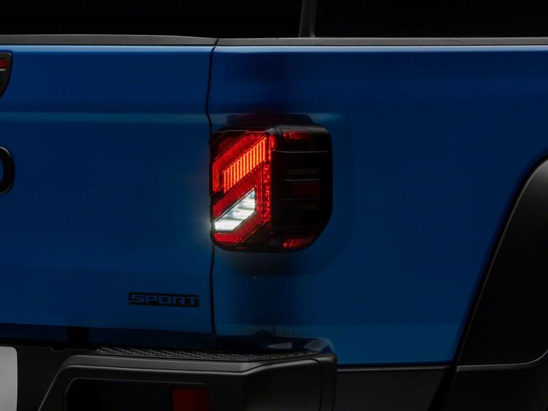 Raxiom 20-23 Jeep Gladiator JT Axial Series LED Tail Lights- Blk Housing (Smoked Lens) - JG18584