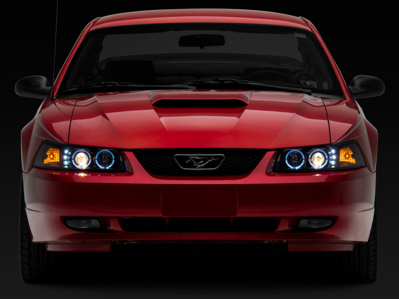 Raxiom 99-04 Ford Mustang Dual LED Halo Projector Headlights- Black Housing (Clear Lens) - 101684