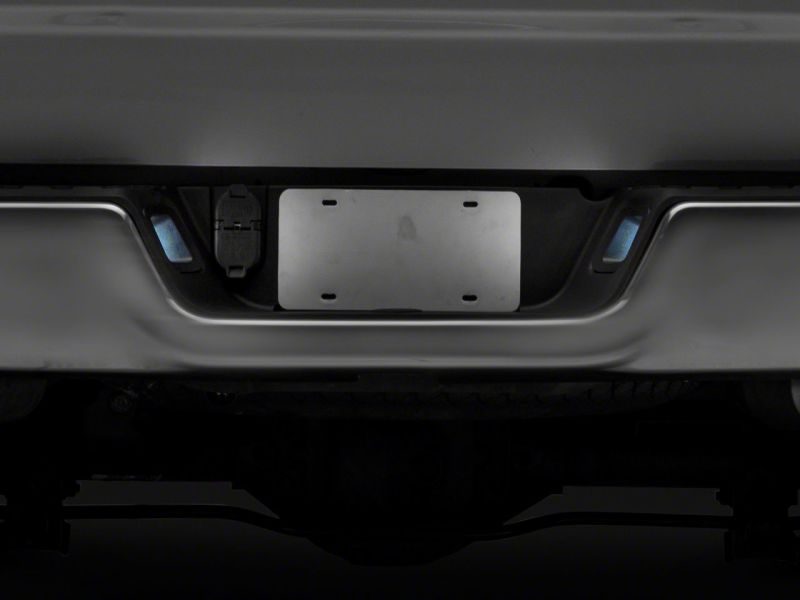 Raxiom 13-18 Dodge RAM 1500 Axial Series LED License Plate Lamps- Smoked - R117120