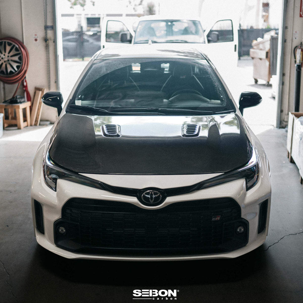 Seibon 23-24 Toyota GR Corolla OE-Style Double-Sided Carbon Fiber Hood - HD23TYGRCOR-OE-DS