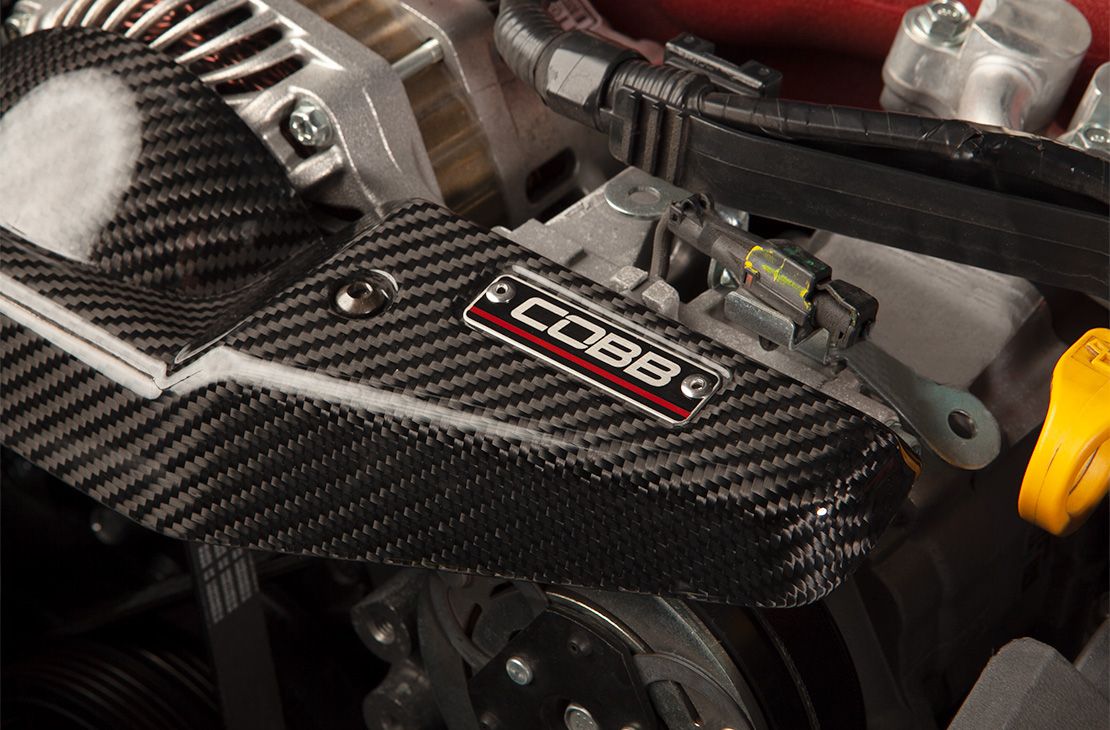 Cobb 08-21 Subaru STI/08-14 Subaru WRX Redline Carbon Fiber Alternator Cover - Gloss Finish - 422600
