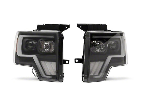 Raxiom 09-14 Ford F-150 G4 Projector Headlights- Black Housing (Clear Lens) - T544003 for 2009-2014 Ford F 150 - front view