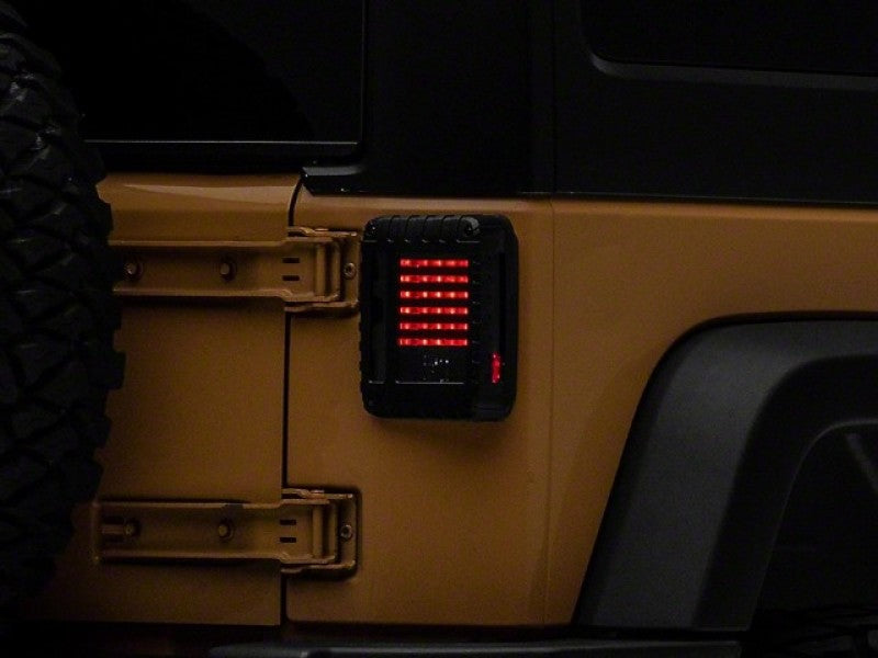 Raxiom 07-18 Jeep Wrangler JK LED Tail Lights- Black Housing (Smoked Lens) - J115435