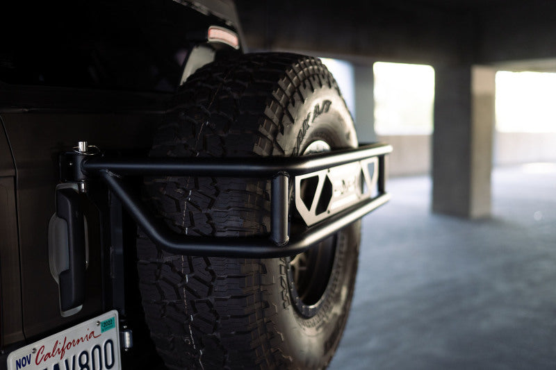 DV8 Offroad 21-23 Ford Bronco Spare Tire Guard &amp; Accessory Mount - TCBR-01