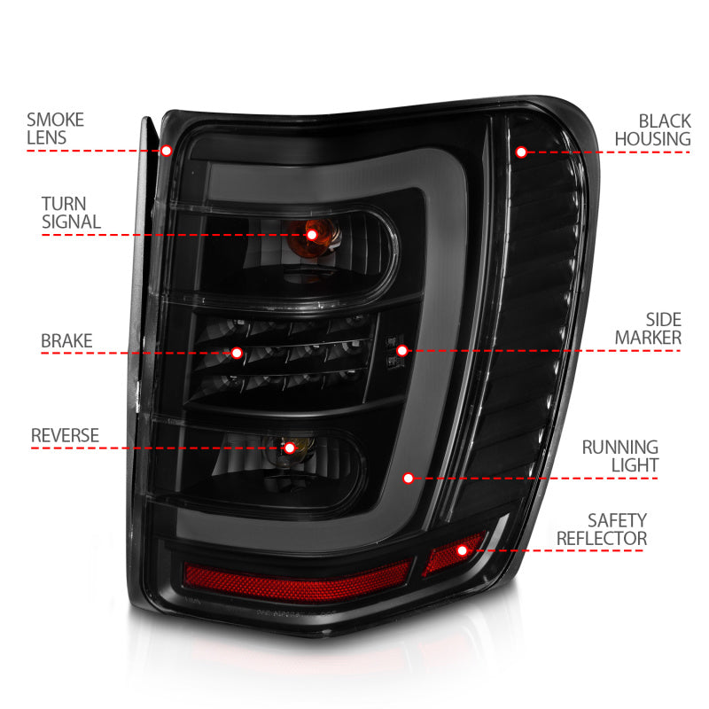 ANZO 1999-2004 Jeep Grand Cherokee LED Tail Lights w/ Light Bar Black Housing Smoke Lens - 311395