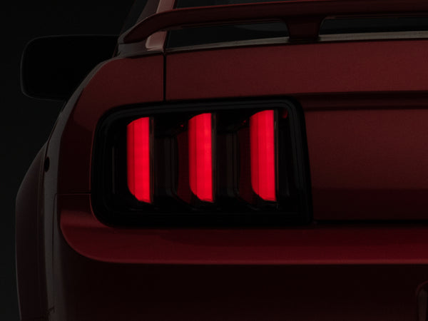 Raxiom 05-09 Ford Mustang Vector V2 LED Tail Lights- Black Housing (Smoked Lens) - 408588 for 2005-2009 Ford Mustang - front 